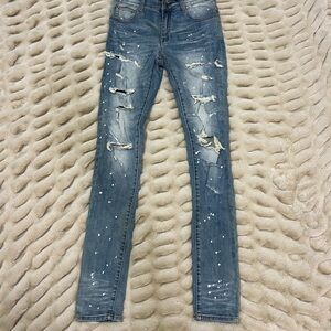 AMIRI Blue Distressed Skinny Jeans